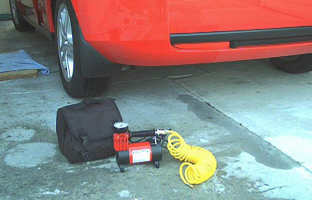 Attached picture 1953359924-air_pump_on_car3.jpg